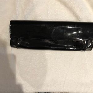 Clutch patent leather
